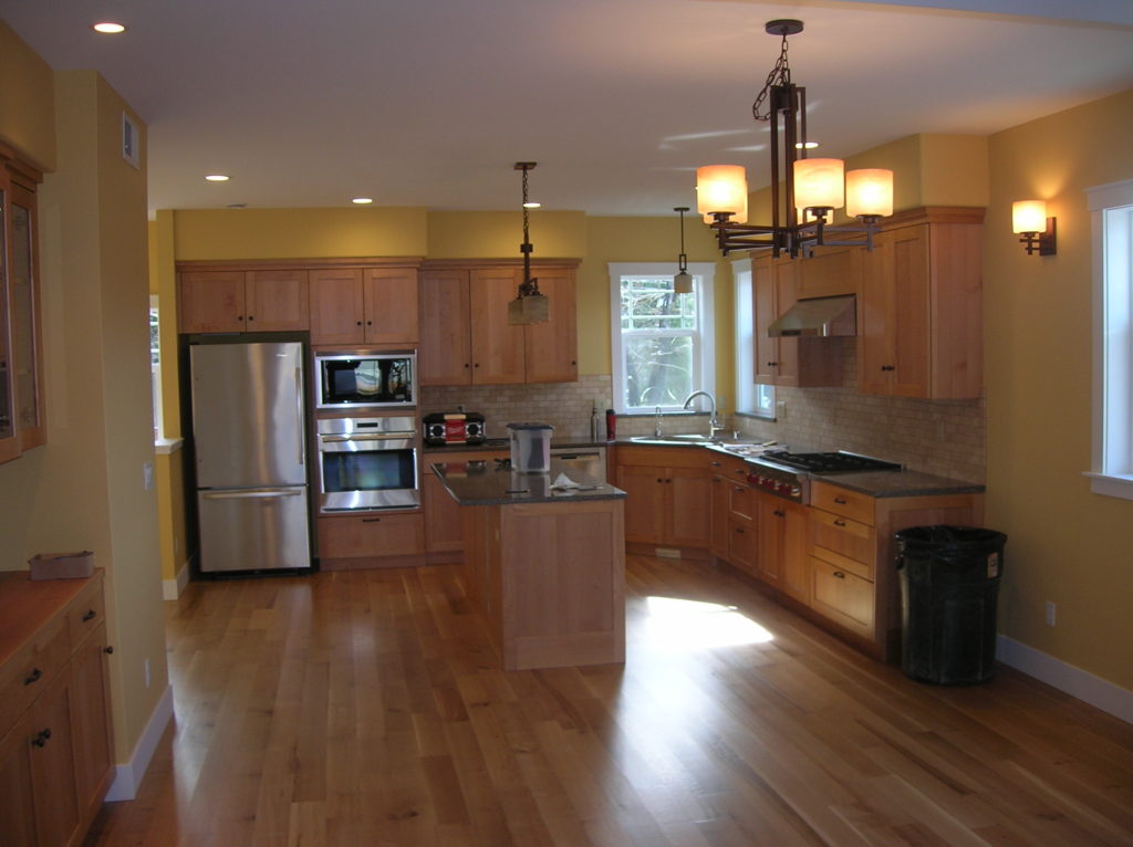 A Kingston kitchen, painted yellow by Tim Rovik Painting